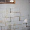 A cracked foundation wall near a window in a Thermopolis home