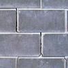 A diagonal stair-step crack found along a foundation wall in a Buffalo home