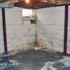 Rusted, corroded i-beams found with a failing foundation in a Mills home.