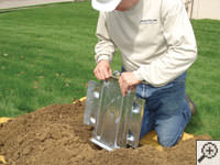 Steel earth anchor assembly installation in Rawlins.