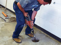 Coring the concrete of a concrete slab floor in Lander