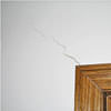 wall cracks along a doorway in a Torrington home.