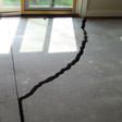 a huge crack in a concrete slab floor in Gillette