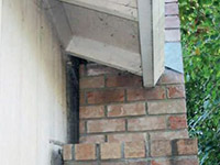 A chimney leaning away from the home on a Wilson foundation