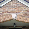 Major tuckpointing on a home archway over a door, with tuckpointing several inches wide that has failed on a Sheridan home