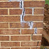 Tuckpointing that cracked due to foundation settlement of a Casper home