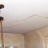 Drywall cracks in Laramie that were poorly patched and repaired.