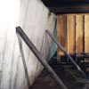 Temporary foundation wall supports stabilizing a Rock Springs home