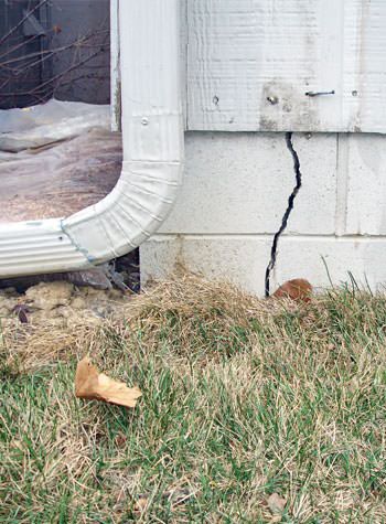 foundation wall cracks due to street creep in Evansville