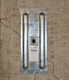 A fully exposed wall anchor plate installed along a Edgerton foundation wall