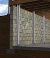 I-beam foundation wall supports installed in a Alcova basement.
