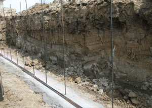 Soil layers exposed while excavating to construct a new foundation in Cody