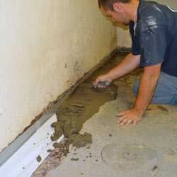 Testing a French drain system in a Cody home.