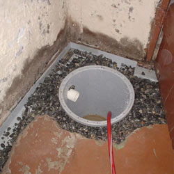 Installing a sump in a sump pump liner in a Gillette home
