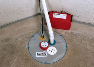 A sump pump system with a battery backup system installed in Wilson