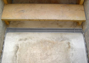Our grated drain system installed on a leaking basement staircase in Parkman.