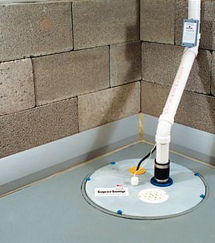 A baseboard basement drain pipe system installed in Cody
