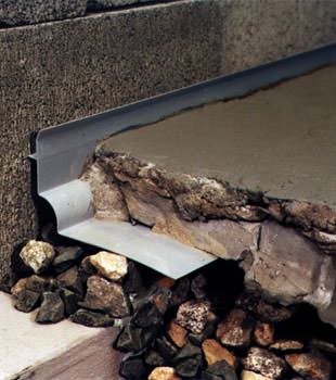 a custom designed basement drain system for thin basement floors in Thermopolis.