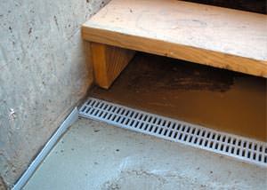 a hatchway entrance in Mills that has been protected from flooding by our TrenchDrain basement drainage system.