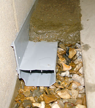 A basement drain system installed in a Green River home