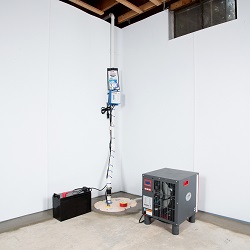 Sump pump system, dehumidifier, and basement wall panels installed during a sump pump installation in Torrington