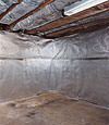 An energy efficient radiant heat and vapor barrier for a Clearmont basement finishing project