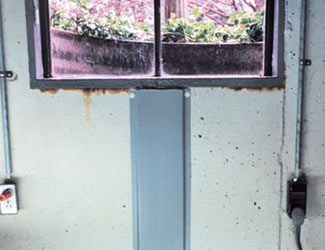 Repaired waterproofed basement window leak in Rock Springs