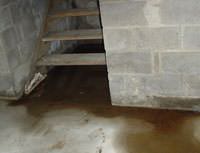 Water Pouring into a Cody Basement through Hatchway Doors